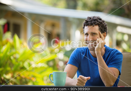 To use this stock image in your creative project, please select the size you need over to the right and click the "Add to Cart" button.
Your downloaded image will come with the Cutcaster watermark removed so don’t worry about the watermark you see on this page. Laughing Man Sitting Outdoors stock photo, Laughing man with coffee sitting outdoors in Maui by Scott Griessel