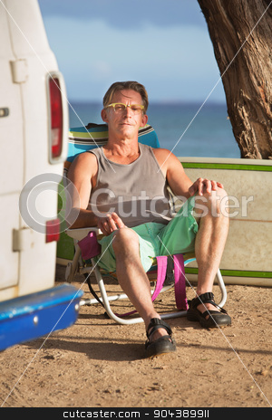 To use this stock image in your creative project, please select the size you need over to the right and click the "Add to Cart" button.
Your downloaded image will come with the Cutcaster watermark removed so don’t worry about the watermark you see on this page. Attractive Man Sitting with Surfboard stock photo, Attractive calm man sitting with surfboard behind him by Scott Griessel