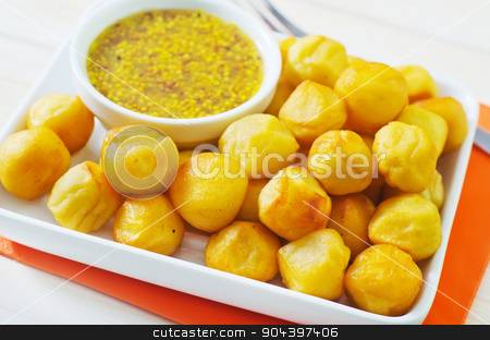 To use this stock image in your creative project, please select the size you need over to the right and click the "Add to Cart" button.
Your downloaded image will come with the Cutcaster watermark removed so don’t worry about the watermark you see on this page. potato balls stock photo, potato balls by tycoon