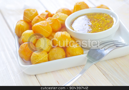 To use this stock image in your creative project, please select the size you need over to the right and click the "Add to Cart" button.
Your downloaded image will come with the Cutcaster watermark removed so don’t worry about the watermark you see on this page. potato balls stock photo, potato balls by tycoon