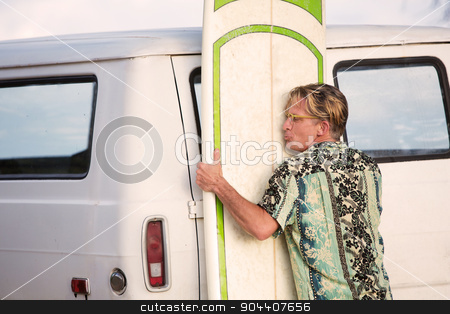 To use this stock image in your creative project, please select the size you need over to the right and click the "Add to Cart" button.
Your downloaded image will come with the Cutcaster watermark removed so don’t worry about the watermark you see on this page. Man Lifting Heavy Surfboard stock photo, One middle aged man lifting heavy surfboard by Scott Griessel