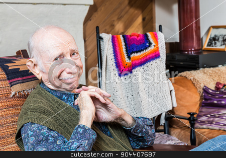 To use this stock image in your creative project, please select the size you need over to the right and click the "Add to Cart" button.
Your downloaded image will come with the Cutcaster watermark removed so don’t worry about the watermark you see on this page. Smiling Elderly Gentleman stock photo, Smiling elderly man sitting on a chair indoors by Scott Griessel
