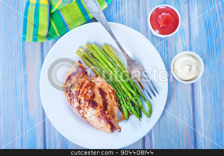 To use this stock image in your creative project, please select the size you need over to the right and click the "Add to Cart" button.
Your downloaded image will come with the Cutcaster watermark removed so don’t worry about the watermark you see on this page. chicken with asparagus stock photo, fried chicken and asparagus on the white plate by tycoon