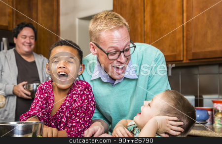 To use this stock image in your creative project, please select the size you need over to the right and click the "Add to Cart" button.
Your downloaded image will come with the Cutcaster watermark removed so don’t worry about the watermark you see on this page. Family with Two Gay Men Laughing stock photo, Same sex couple with two adorable children laughing in kitchen by Scott Griessel