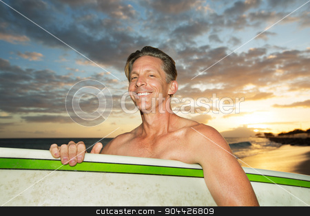 To use this stock image in your creative project, please select the size you need over to the right and click the "Add to Cart" button.
Your downloaded image will come with the Cutcaster watermark removed so don’t worry about the watermark you see on this page. Surfing at Sunset stock photo, One adult Caucasian surfer with surfboard at sunset by Scott Griessel