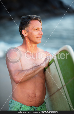 To use this stock image in your creative project, please select the size you need over to the right and click the "Add to Cart" button.
Your downloaded image will come with the Cutcaster watermark removed so don’t worry about the watermark you see on this page. Confident Man with Green Surfboard stock photo, Confident middle aged surfer with surfboard looking over by Scott Griessel