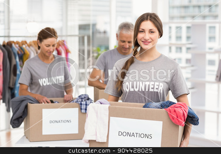 To use this stock image in your creative project, please select the size you need over to the right and click the "Add to Cart" button.
Your downloaded image will come with the Cutcaster watermark removed so don’t worry about the watermark you see on this page. Smiling female volunteer carrying donation box stock photo, Portrait of smiling female volunteer carrying donation box in the office by Wavebreak Media