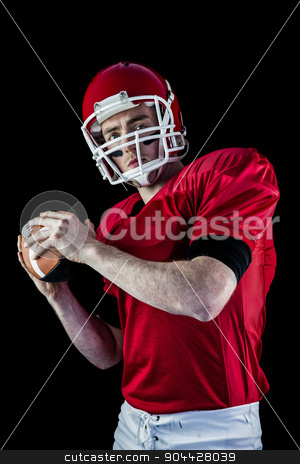 To use this stock image in your creative project, please select the size you need over to the right and click the "Add to Cart" button.
Your downloaded image will come with the Cutcaster watermark removed so don’t worry about the watermark you see on this page. Portrait of american football player being about to throw footba stock photo, Portrait of american football player being about to throw football against black background by Wavebreak Media