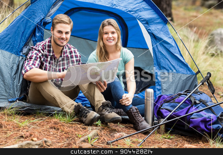 To use this stock image in your creative project, please select the size you need over to the right and click the "Add to Cart" button.
Your downloaded image will come with the Cutcaster watermark removed so don’t worry about the watermark you see on this page. Young pretty hiker couple sitting in a tent looking at map stock photo, Young pretty hiker couple sitting in a tent looking at map in the nature by Wavebreak Media