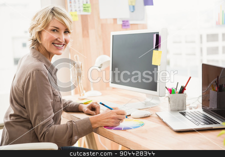 To use this stock image in your creative project, please select the size you need over to the right and click the "Add to Cart" button.
Your downloaded image will come with the Cutcaster watermark removed so don’t worry about the watermark you see on this page. Smiling casual designer working with colour chart stock photo, Portrait of smiling casual designer working with colour chart in the office by Wavebreak Media