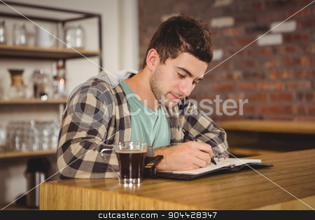 To use this stock image in your creative project, please select the size you need over to the right and click the "Add to Cart" button.
Your downloaded image will come with the Cutcaster watermark removed so don’t worry about the watermark you see on this page. Hipster having coffee and writing in planner stock photo, Hipster having coffee and writing in planner at coffee shop by Wavebreak Media