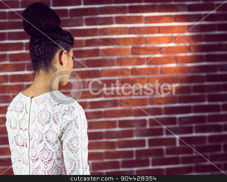 To use this stock image in your creative project, please select the size you need over to the right and click the "Add to Cart" button.
Your downloaded image will come with the Cutcaster watermark removed so don’t worry about the watermark you see on this page. A serious woman looking at the background stock photo, A serious woman looking at the background on a brick wall by Wavebreak Media