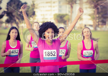 To use this stock image in your creative project, please select the size you need over to the right and click the "Add to Cart" button.
Your downloaded image will come with the Cutcaster watermark removed so don’t worry about the watermark you see on this page. Cheering young woman winning breast cancer marathon stock photo, Portrait of cheering young woman winning breast cancer marathon in parkland by Wavebreak Media