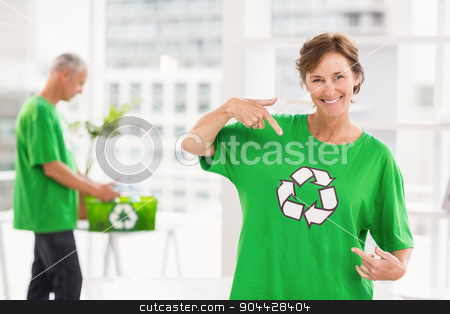 To use this stock image in your creative project, please select the size you need over to the right and click the "Add to Cart" button.
Your downloaded image will come with the Cutcaster watermark removed so don’t worry about the watermark you see on this page. Smiling eco-minded woman showing her recycling shirt stock photo, Portrait of smiling eco-minded woman showing her recycling shirt in the office by Wavebreak Media