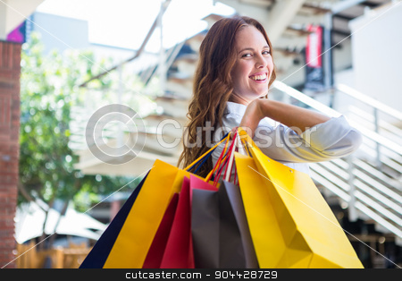 To use this stock image in your creative project, please select the size you need over to the right and click the "Add to Cart" button.
Your downloaded image will come with the Cutcaster watermark removed so don’t worry about the watermark you see on this page. Pretty woman shopping at the mall stock photo, Pretty woman shopping at the mall on a sunny day by Wavebreak Media