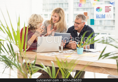 To use this stock image in your creative project, please select the size you need over to the right and click the "Add to Cart" button.
Your downloaded image will come with the Cutcaster watermark removed so don’t worry about the watermark you see on this page. Smiling business team discussing over a tablet stock photo, Smiling business team discussing over a tablet at office by Wavebreak Media