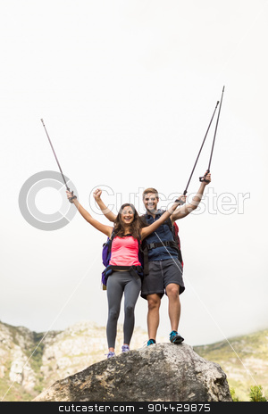 To use this stock image in your creative project, please select the size you need over to the right and click the "Add to Cart" button.
Your downloaded image will come with the Cutcaster watermark removed so don’t worry about the watermark you see on this page. Young happy joggers standing on rock cheering stock photo, Young happy joggers standing on rock cheering in the nature by Wavebreak Media