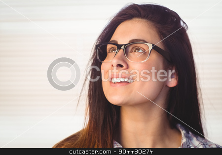 To use this stock image in your creative project, please select the size you need over to the right and click the "Add to Cart" button.
Your downloaded image will come with the Cutcaster watermark removed so don’t worry about the watermark you see on this page. Pretty hipster looking up and smiling stock photo, Pretty hipster looking up and smiling in a bright room by Wavebreak Media