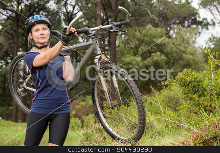 To use this stock image in your creative project, please select the size you need over to the right and click the "Add to Cart" button.
Your downloaded image will come with the Cutcaster watermark removed so don’t worry about the watermark you see on this page. Athletic blonde carrying her mountain bike stock photo, Athletic blonde carrying her mountain bike in the nature by Wavebreak Media