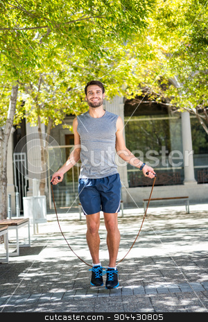 To use this stock image in your creative project, please select the size you need over to the right and click the "Add to Cart" button.
Your downloaded image will come with the Cutcaster watermark removed so don’t worry about the watermark you see on this page. Handsome athlete doing jumping rope stock photo, Portrait of an handsome athlete doing jumping rope on a sunny day by Wavebreak Media