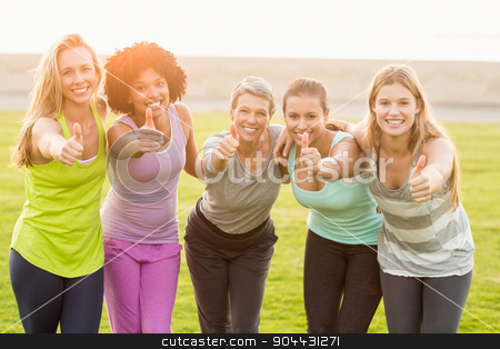 To use this stock image in your creative project, please select the size you need over to the right and click the "Add to Cart" button.
Your downloaded image will come with the Cutcaster watermark removed so don’t worry about the watermark you see on this page. Smiling sporty women doing thumbs up stock photo, Portrait of smiling sporty women doing thumbs up in parkland by Wavebreak Media