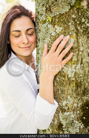 To use this stock image in your creative project, please select the size you need over to the right and click the "Add to Cart" button.
Your downloaded image will come with the Cutcaster watermark removed so don’t worry about the watermark you see on this page. Beautiful brunette hugging a tree stock photo, Beautiful brunette hugging a tree on a sunny day by Wavebreak Media
