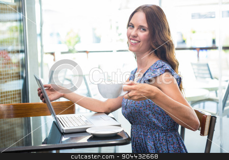 To use this stock image in your creative project, please select the size you need over to the right and click the "Add to Cart" button.
Your downloaded image will come with the Cutcaster watermark removed so don’t worry about the watermark you see on this page. Pretty brunette using her laptop stock photo, Pretty brunette using her laptop in a coffee shop by Wavebreak Media