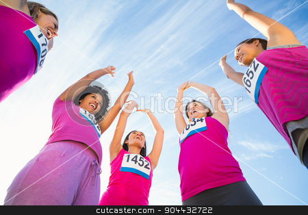 To use this stock image in your creative project, please select the size you need over to the right and click the "Add to Cart" button.
Your downloaded image will come with the Cutcaster watermark removed so don’t worry about the watermark you see on this page. Five cheering runners supporting breast cancer marathon stock photo, Five cheering runners supporting breast cancer marathon in parkland by Wavebreak Media