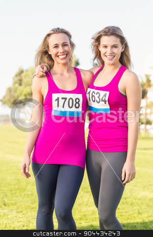 To use this stock image in your creative project, please select the size you need over to the right and click the "Add to Cart" button.
Your downloaded image will come with the Cutcaster watermark removed so don’t worry about the watermark you see on this page. Two smiling blondes supporting breast cancer marathon stock photo, Portrait of two smiling blondes supporting breast cancer marathon in parkland by Wavebreak Media