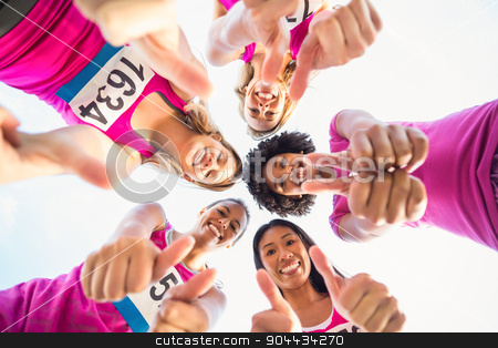 To use this stock image in your creative project, please select the size you need over to the right and click the "Add to Cart" button.
Your downloaded image will come with the Cutcaster watermark removed so don’t worry about the watermark you see on this page. Five smiling runners supporting breast cancer marathon stock photo, Portrait of five smiling runners supporting breast cancer marathon in parkland by Wavebreak Media