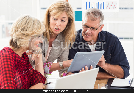 To use this stock image in your creative project, please select the size you need over to the right and click the "Add to Cart" button.
Your downloaded image will come with the Cutcaster watermark removed so don’t worry about the watermark you see on this page. Smiling business team discussing over a tablet stock photo, Smiling business team discussing over a tablet at office by Wavebreak Media