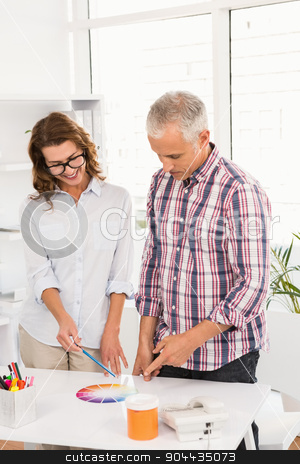 To use this stock image in your creative project, please select the size you need over to the right and click the "Add to Cart" button.
Your downloaded image will come with the Cutcaster watermark removed so don’t worry about the watermark you see on this page. Casual designers working with colour chart stock photo, Casual designers working with colour chart in the office by Wavebreak Media