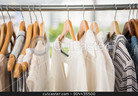 To use this stock image in your creative project, please select the size you need over to the right and click the "Add to Cart" button.
Your downloaded image will come with the Cutcaster watermark removed so don’t worry about the watermark you see on this page. Clothes on clothes rail stock photo, Clothes on clothes rail in clothing store by Wavebreak Media