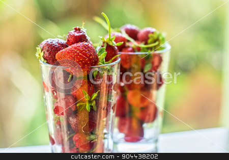 To use this stock image in your creative project, please select the size you need over to the right and click the "Add to Cart" button.
Your downloaded image will come with the Cutcaster watermark removed so don’t worry about the watermark you see on this page. Strawberry stock photo, Fresh ripe strawberry in a glass by olinchuk