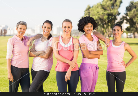 To use this stock image in your creative project, please select the size you need over to the right and click the "Add to Cart" button.
Your downloaded image will come with the Cutcaster watermark removed so don’t worry about the watermark you see on this page. Smiling women wearing pink for breast cancer stock photo, Portrait of smiling women wearing pink for breast cancer in parkland by Wavebreak Media