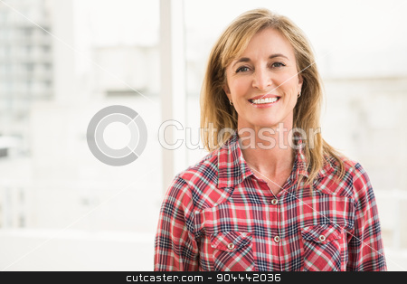 To use this stock image in your creative project, please select the size you need over to the right and click the "Add to Cart" button.
Your downloaded image will come with the Cutcaster watermark removed so don’t worry about the watermark you see on this page. Casual businesswoman smiling to camera stock photo, Portrait of casual businesswoman smiling to camera in the office by Wavebreak Media