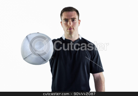 To use this stock image in your creative project, please select the size you need over to the right and click the "Add to Cart" button.
Your downloaded image will come with the Cutcaster watermark removed so don’t worry about the watermark you see on this page. Rugby player handing a rugby ball stock photo, Portrait of a rugby player handing a rugby ball by Wavebreak Media