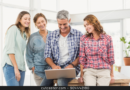 To use this stock image in your creative project, please select the size you need over to the right and click the "Add to Cart" button.
Your downloaded image will come with the Cutcaster watermark removed so don’t worry about the watermark you see on this page. Casual business team having a meeting using laptop stock photo, Casual business team having a meeting using laptop in creative office by Wavebreak Media