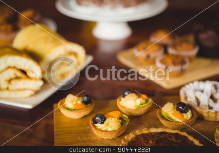 To use this stock image in your creative project, please select the size you need over to the right and click the "Add to Cart" button.
Your downloaded image will come with the Cutcaster watermark removed so don’t worry about the watermark you see on this page. Several treats on the counter stock photo, Several treats on the counter at coffee shop by Wavebreak Media