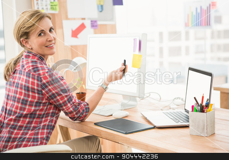 To use this stock image in your creative project, please select the size you need over to the right and click the "Add to Cart" button.
Your downloaded image will come with the Cutcaster watermark removed so don’t worry about the watermark you see on this page. Smiling casual designer working with digitizer stock photo, Portrait of smiling casual designer working with digitizer in the office by Wavebreak Media