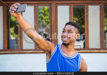 To use this stock image in your creative project, please select the size you need over to the right and click the "Add to Cart" button.
Your downloaded image will come with the Cutcaster watermark removed so don’t worry about the watermark you see on this page. An happy handsome athlete taking a selfie stock photo, An happy handsome athlete taking a selfie on a sunny day by Wavebreak Media