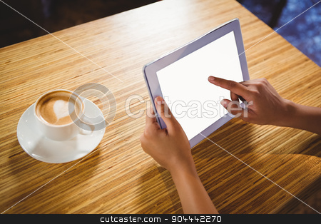 To use this stock image in your creative project, please select the size you need over to the right and click the "Add to Cart" button.
Your downloaded image will come with the Cutcaster watermark removed so don’t worry about the watermark you see on this page. A businesswoman using a tablet and enjoying a coffee stock photo, A businesswoman using a tablet and enjoying a coffee in a cafe by Wavebreak Media