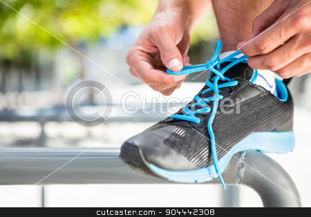 To use this stock image in your creative project, please select the size you need over to the right and click the "Add to Cart" button.
Your downloaded image will come with the Cutcaster watermark removed so don’t worry about the watermark you see on this page. Athlete tying his shoes stock photo, Athlete tying his shoes in the city by Wavebreak Media