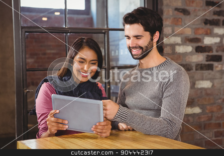To use this stock image in your creative project, please select the size you need over to the right and click the "Add to Cart" button.
Your downloaded image will come with the Cutcaster watermark removed so don’t worry about the watermark you see on this page. Couple looking at the tablet stock photo, Couple looking at the tablet in a cafe by Wavebreak Media