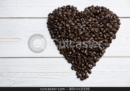 To use this stock image in your creative project, please select the size you need over to the right and click the "Add to Cart" button.
Your downloaded image will come with the Cutcaster watermark removed so don’t worry about the watermark you see on this page. Coffee beans on a table in heart shape stock photo, Coffee beans on a table in heart shape shot in studio by Wavebreak Media