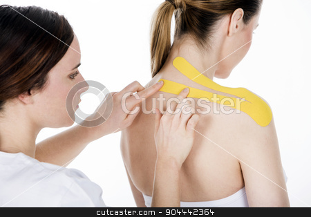 To use this stock image in your creative project, please select the size you need over to the right and click the "Add to Cart" button.
Your downloaded image will come with the Cutcaster watermark removed so don’t worry about the watermark you see on this page. physiotherapist gets taping on the trapezius stock photo, physiotherapist gets taping on the trapezius by Flareimage