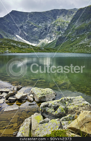 To use this stock image in your creative project, please select the size you need over to the right and click the "Add to Cart" button.
Your downloaded image will come with the Cutcaster watermark removed so don’t worry about the watermark you see on this page. Reflection of Rila Mountain in The Trefoil lake stock photo, Reflection of Rila Mountain in The Trefoil lake, The Seven Rila Lakes, Bulgaria by Stoyan Haytov
