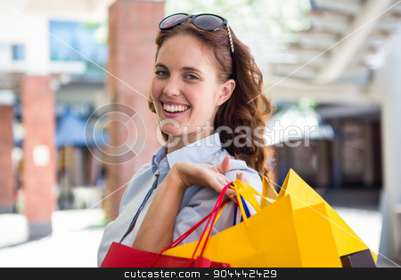 To use this stock image in your creative project, please select the size you need over to the right and click the "Add to Cart" button.
Your downloaded image will come with the Cutcaster watermark removed so don’t worry about the watermark you see on this page. Pretty woman shopping at the mall stock photo, Pretty woman shopping at the mall on a sunny day by Wavebreak Media
