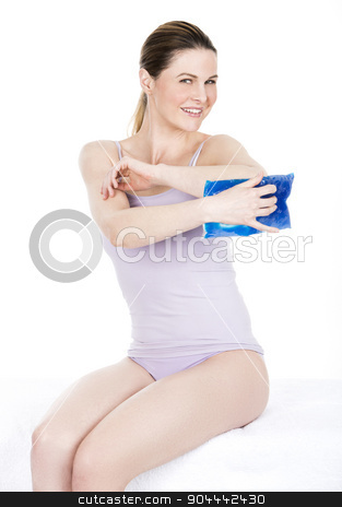 To use this stock image in your creative project, please select the size you need over to the right and click the "Add to Cart" button.
Your downloaded image will come with the Cutcaster watermark removed so don’t worry about the watermark you see on this page. woman with cold hot pack on elbow for therapeutic relief stock photo, woman with cold hot pack on elbow for therapeutic relief by Flareimage