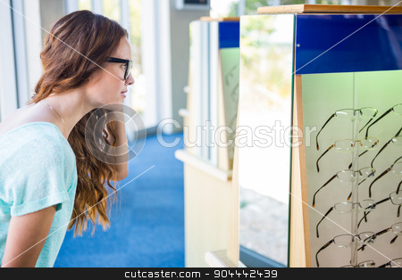 To use this stock image in your creative project, please select the size you need over to the right and click the "Add to Cart" button.
Your downloaded image will come with the Cutcaster watermark removed so don’t worry about the watermark you see on this page. Pretty woman shopping for new glasses stock photo, Pretty woman shopping for new glasses at the optometry store by Wavebreak Media